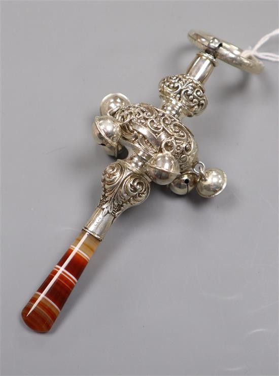 A late Victorian repousse silver childs rattle, with banded agate handle, six bells and a teething ring, Birmingham, 1898.